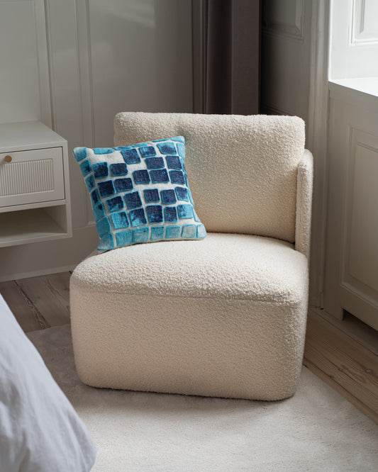 Contemporary wool art cushion in white and blue tones - The Tuftista